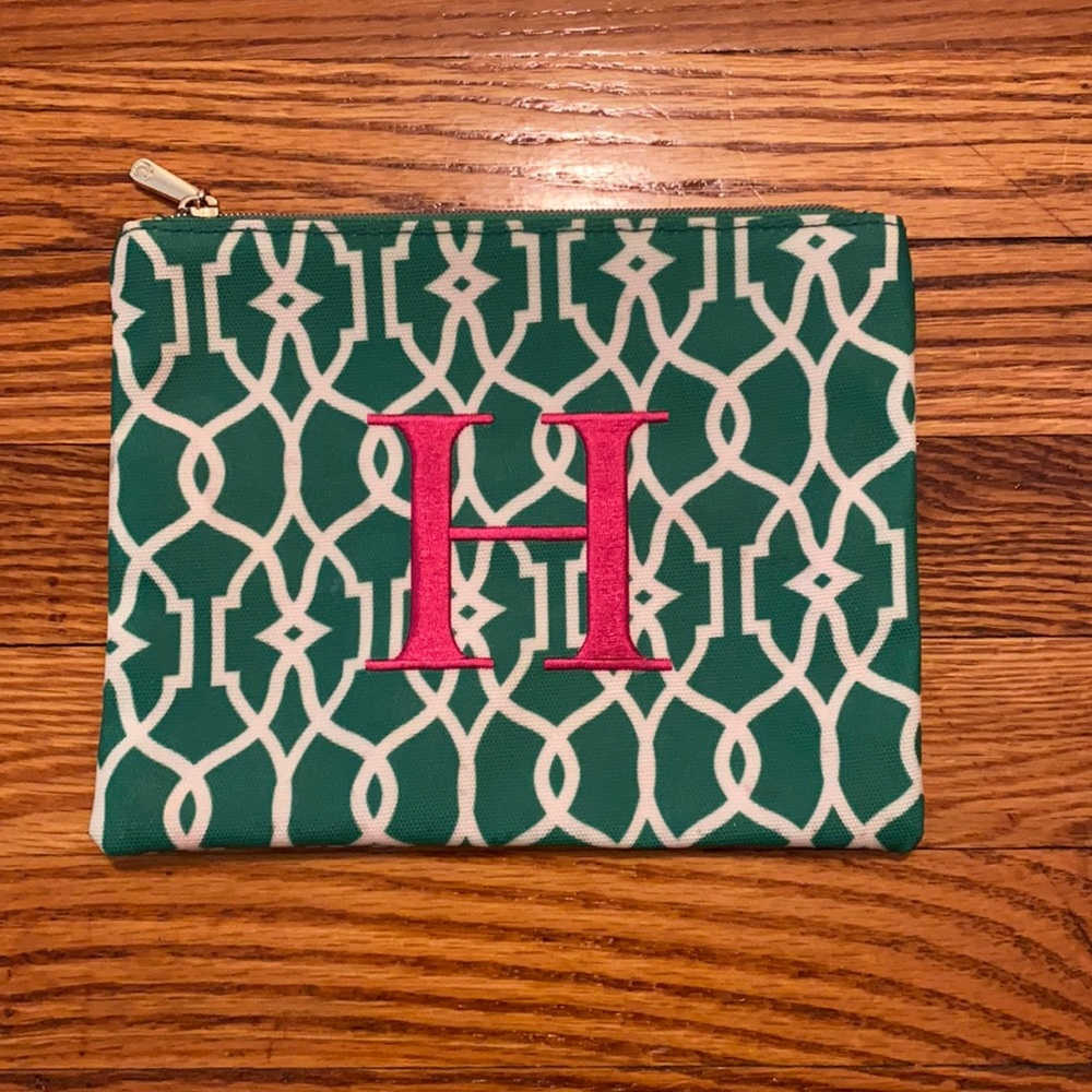 Monogram H cosmetic bag